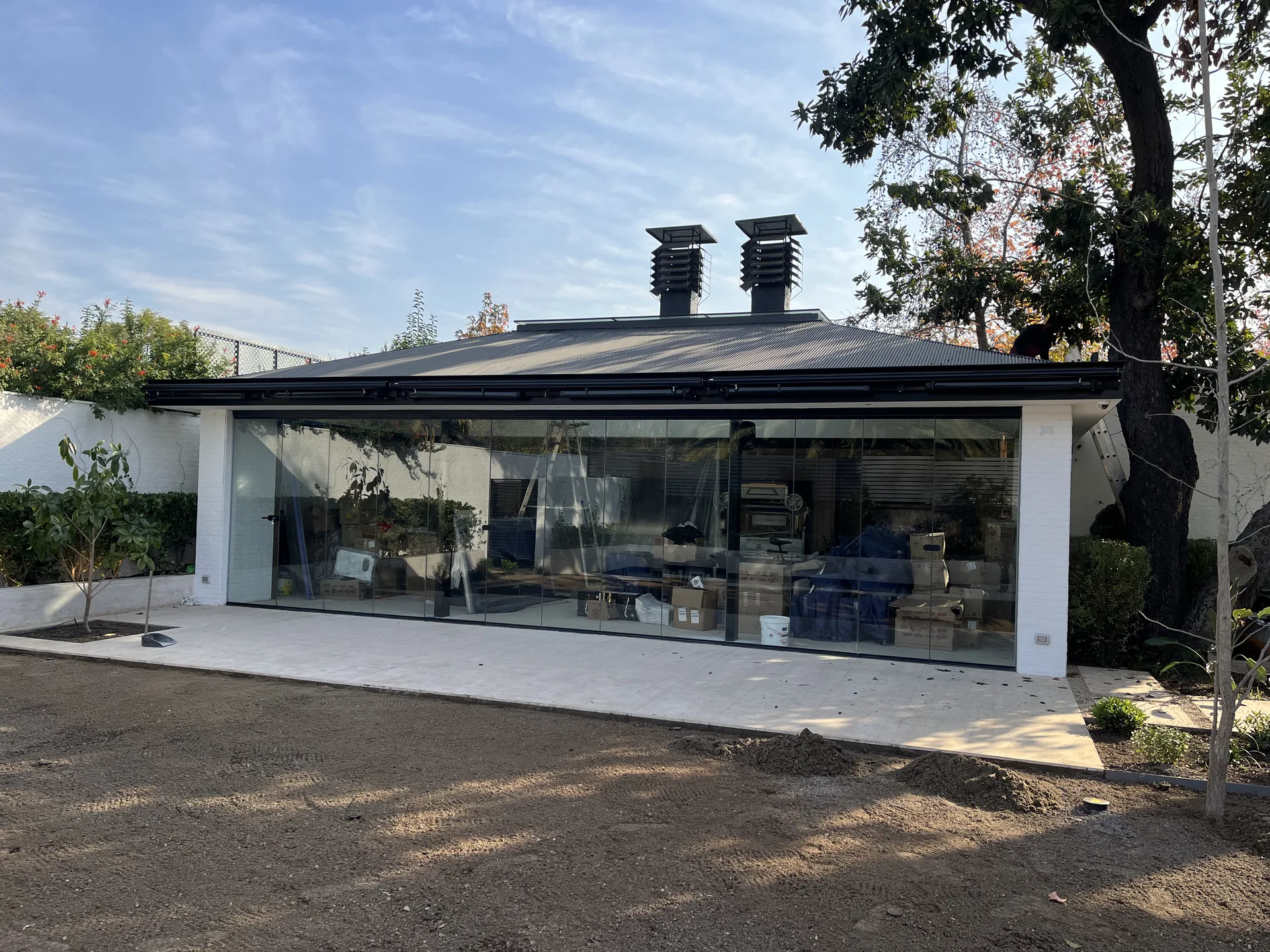 Instalación de cortinas de vidrio plegables — Viento Norte Fachadas